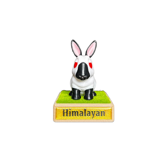 Himalayan rabbit figurine on a grass base with 'Himalayan' text